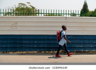 Bie, Angola - August 28TH 2019: Child On His Way To School. Illustrative Editorial.