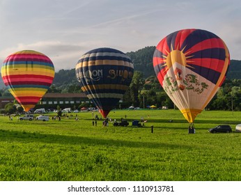 Biella, Italy, June 10, 2018 - Three beautiful and colour hot air balloons at the spring festival, Pollone dal Cielo, Biella