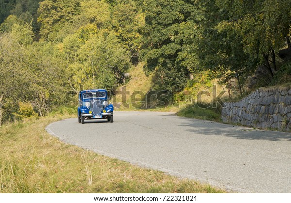 BIELLA / ITALY - SEPTEMBER 24, 2017:\
Vintage car running on country road: a Fiat Balilla Coupè during a\
meeting of historic cars. This model was built in\
1934.