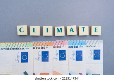 Bielsko, Poland - 02.17.2022: Inscription Climate Next To The Euro Money. Concept Showing European Climate Policy