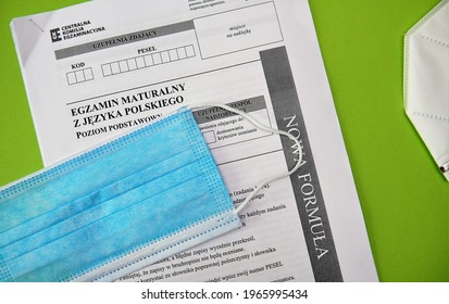 
Bielsko, Poland - 05.01.2021: Protective Mask And Graduation Sheet. Writing Baccalaureate During A Pandemic. Mandatory Equipment For High School Graduates Consisting Of A Protective Mask And A Pen. 