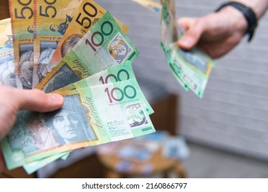 Bielsko, Poland - 05.26.2022: Close-up, detail on Australian dollar banknotes. Australian money in various denominations. Australian economy, business and finance.