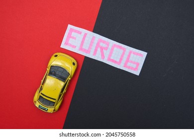 Bielsko, Poland - 09.22.2021: Top View Of The Car And A Card With The Word Euro 6. Concept Showing The European Emission Standard Euro 6. Introducing Restrictive Emission Standards. 