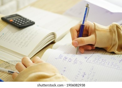 Bielsko-Biala, Poland - 01.31.21:  The Boy Is Solving Math Problems In His Notebook. Repeating Before The Matura Exam. Secondary School Exit Exam In Various European Countries. 