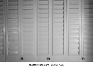 Bifold Closet White Color With Vignette, Still Life, Black And White Tone, Scary Tone, Halloween Surprise,