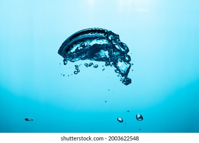 Big Air Bubble Are Rising In The Blue Water , Air Bubble Isolated On 
Blue Background.
