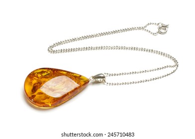 Big amber on the silver chain isolated