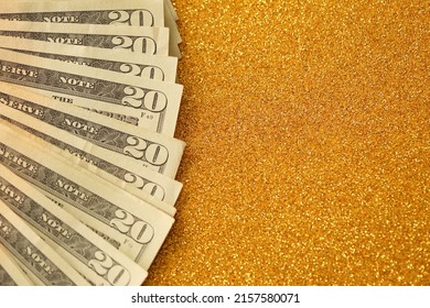 Big Amount Of Old Twenty Dollar Bills On Golden Background. Money Earnings, Payday Or Tax Paying Period Concept