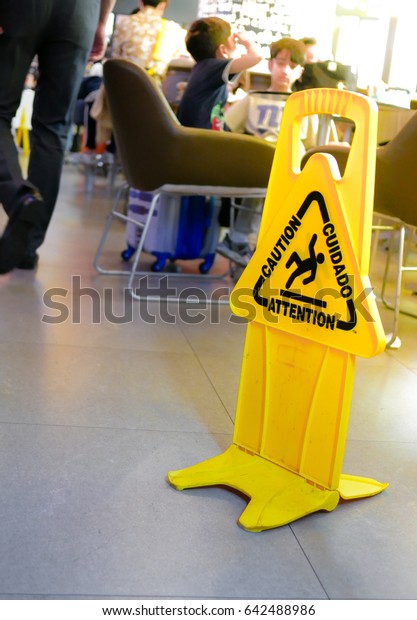 Big Attentioncaution Wetslippery Floor Sign Yellow Stock Photo
