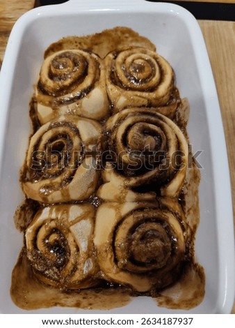 Big bash-cooking of cinnamon roll