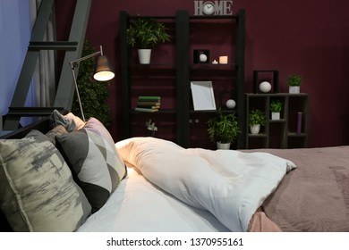 Big bed in stylish interior of room - Shutterstock ID 1370955161