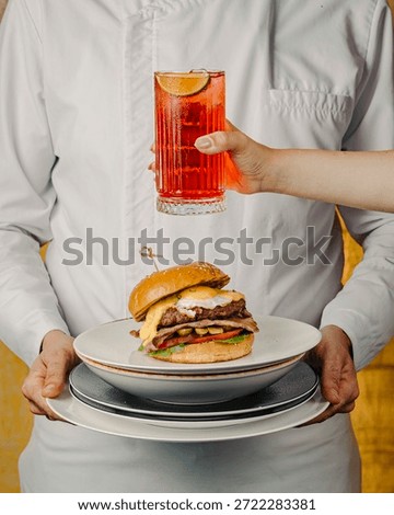 Big Beef chef burger
Serving top on egg and cheese. 
Best burger with fresh cold drink
3 hands serving
Grooming serve
American service
American fast food
Food photography