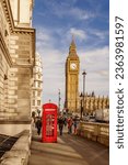 big ben and city tower with red telephone box in Westminster London England.