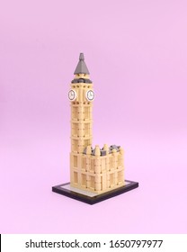 Big Ben clock tower model on lilac background