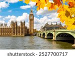 Big Ben with Houses of Parliament and Westminster bridge in autumn, London, UK