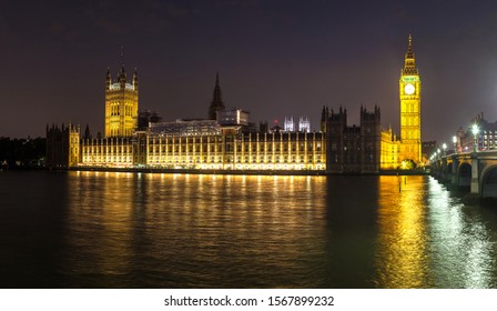 The Big Ben, The Houses Of Parliament And Westminster Bridge In London In A Beautiful Summer Night, England, United Kingdom