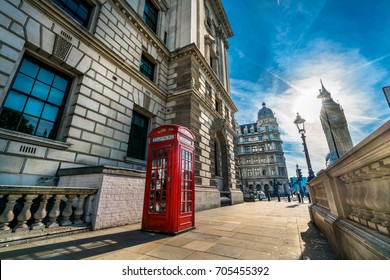 Big Ben On The Background And Red Telephone Booth In London At Sunrise 