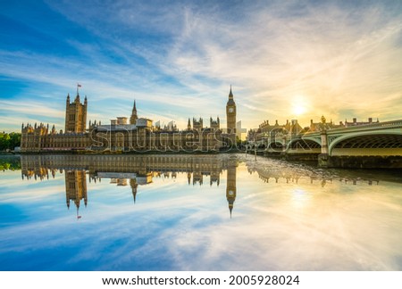 Big Ben at sunset with reflection in London, England