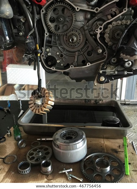Big Bike\
Motorcycle maintenance replace a new part at garage after long term\
used , Detail of a motorcycle\
gearbox
