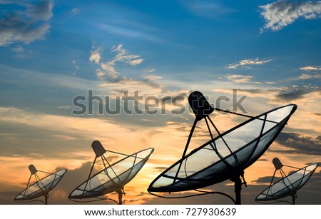 Big black Satellite Dish on sunset background