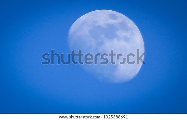 Big Blue Moon with Daytime\
Sky