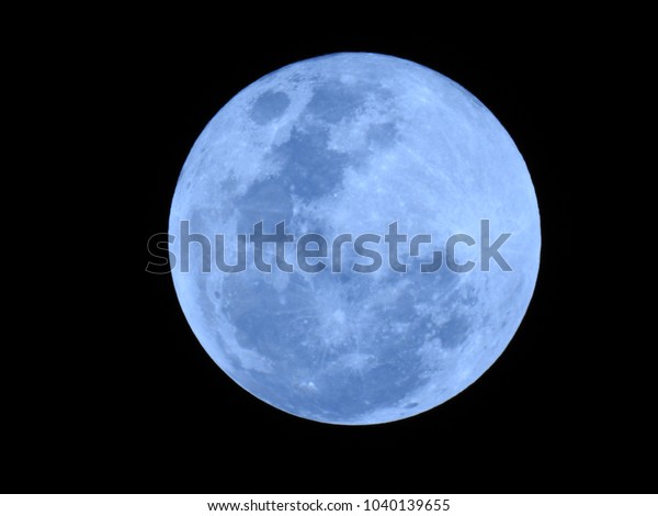 Big Blue Moon, Lunar. It is an astronomical body\
that orbits planet Earth.