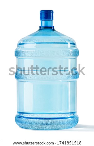 Big Blue Transparent Pet plastic water bottle for cooler. 19 liter, 5 gallon refillable plastic water BPA free jug dispenser. Concept of a mineral water delivery for homes and offices. Studio shot.