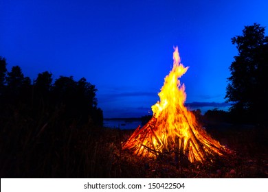 Big Bonfire Against Blue Night Sky