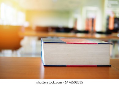 Big Book On Study Desk, Educational Or Academic Concept Picture. Learning Environment At School, College, Or University Campus. Reading Zone Or Self Access Learning Center. Preparing For Test Or Exams