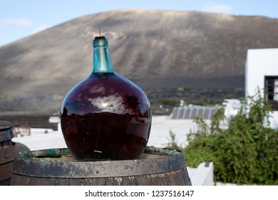 Big Bottle With Red Grape Wine. Lanzarote. Canary Islands. Spain