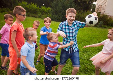 The Big Boy Does Not Want To Share The Ball With Small Children