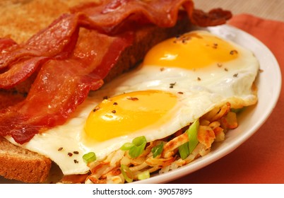 Big Breakfast Of Eggs, Bacon, Toast And Hash Browns