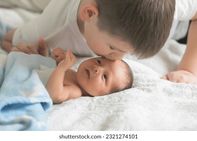 Big brother with his little newborn brother. love family concept - Powered by Shutterstock