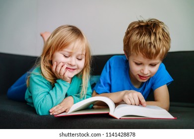 Big Brother Reading Book To Little Sister, Home Learning