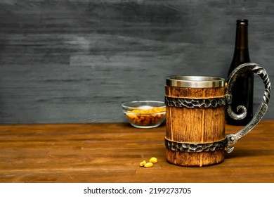 Big Brown Mug Of Beer,ale Bottle And Crispy Snacks, Pretzels, Corn, Nuts In Bowl On Wooden Table, Background Close Up. Alcohol Cocktail, Bar Drink, Booze Party Concept.mockup, Template, Copy Space.