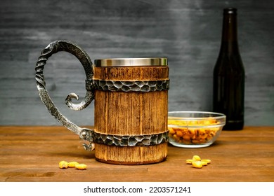 Big Brown Mug Of Beer,ale Bottle And Crispy Snacks, Pretzels, Corn, Nuts In Bowl On Wooden Table, Background Close Up. Alcohol Cocktail, Bar Drink, Booze Party Concept.mockup, Template, Copy Space.