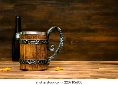 Big Brown Mug Of Beer,ale Bottle And Crispy Snacks, Pretzels, Corn, Nuts In Bowl On Wooden Table, Background Close Up. Alcohol Cocktail, Bar Drink, Booze Party Concept.mockup, Template, Copy Space.