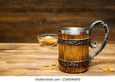 Big Brown Mug Of Beer,ale And Crispy Snacks, Pretzels, Corn, Nuts In Bowl On Wooden Table, Background Close Up. Alcohol Cocktail, Bar Drink, Booze Party Concept.mockup, Template, Copy Space.