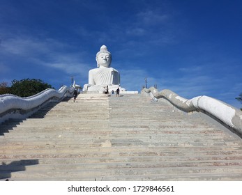 Big Buddha Above A Long Staircase In Thailand