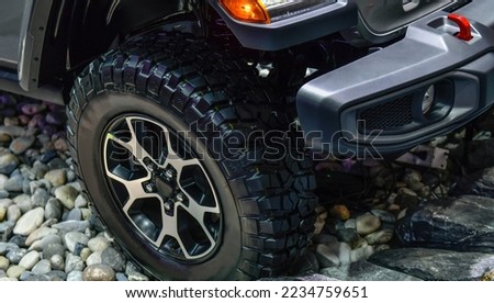 Big car tire. Tire for offroad in the countryside