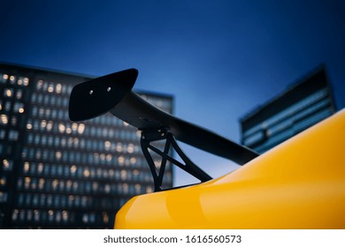 Big Carbon Spoiler Wing On The Trunk Of Modern Supercar