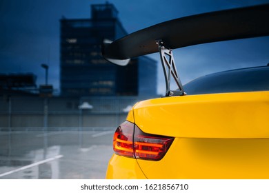 Big Carbon Spoiler Wing On The Trunk Of Modern Supercar