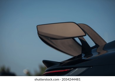 Big Carbon Spoiler Wing On The Trunk Of Modern Supercar