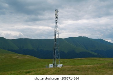 Big Cell Tower And Storm Clouds In The Beautiful Mountains