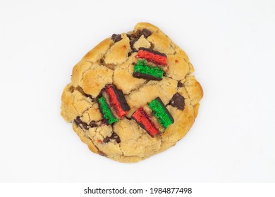 Big Chocolate Chip Cookie With Italian Rainbow Cookies On A White Background