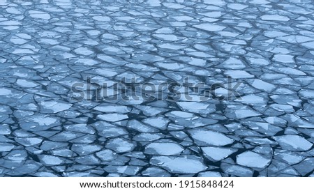 Big chunks of ice blocks forming a beautiful pattern, after the icebreaker ship passed by and crushed the densely packed ice. This is a necessity so that the sea traffic can continue in Stockholm.