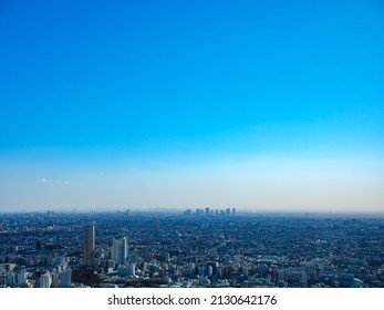 big city in the blue sky