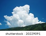 Big cloud over hills