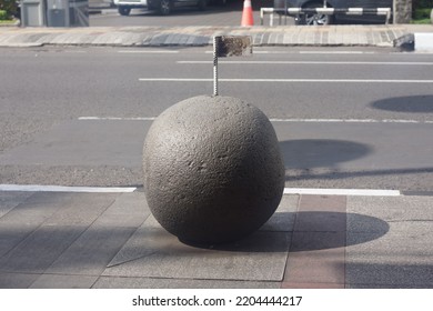 Big cobblestone on the street corner