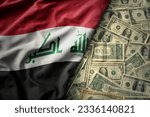 big colorful waving national flag of iraq on a american dollar money background. finance concept